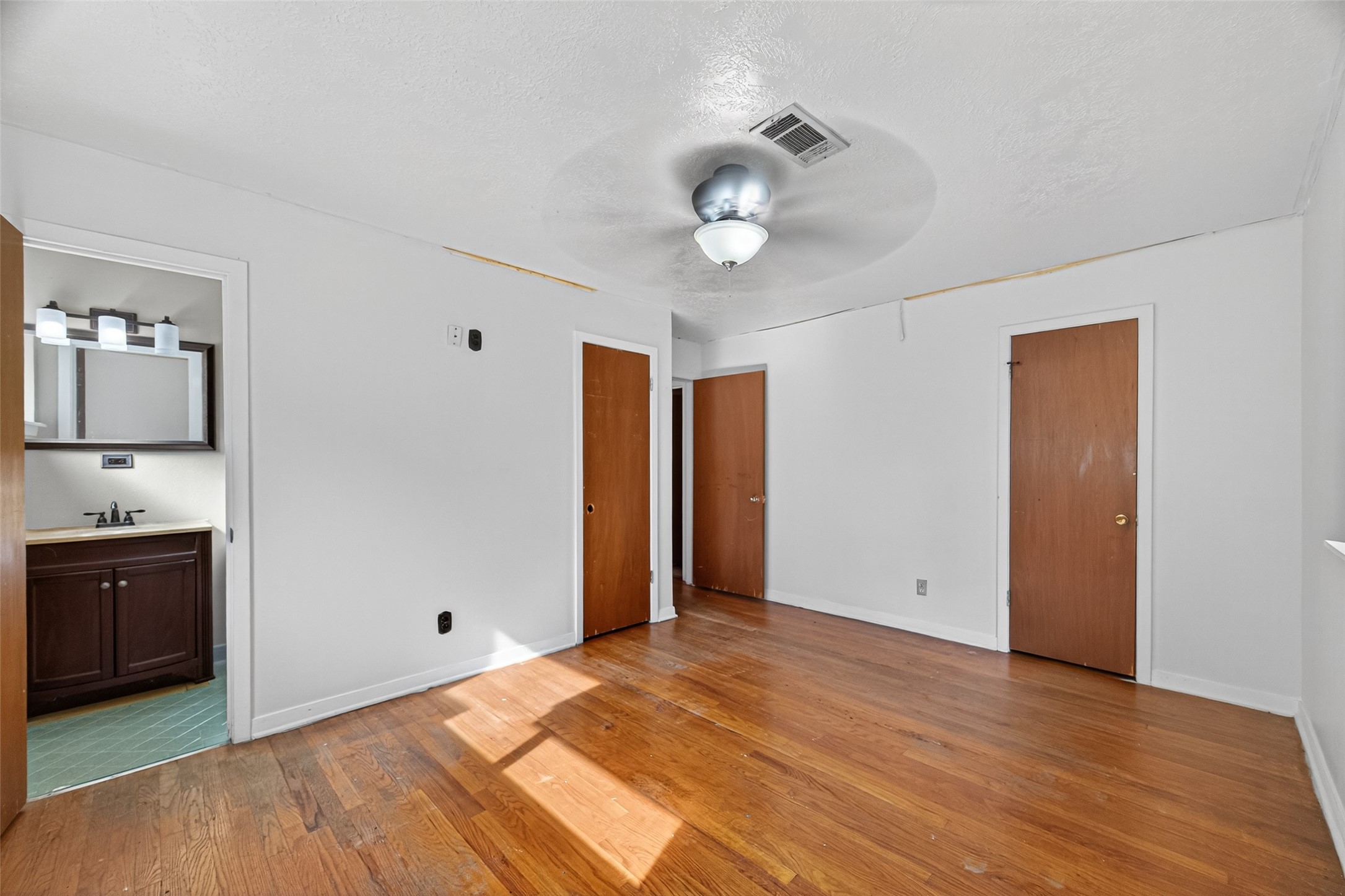 2609 Raspberry Lane Pasadena, TX 77502 - Photo 31 of 40 a view of a kitchen with a sink and a refrigerator