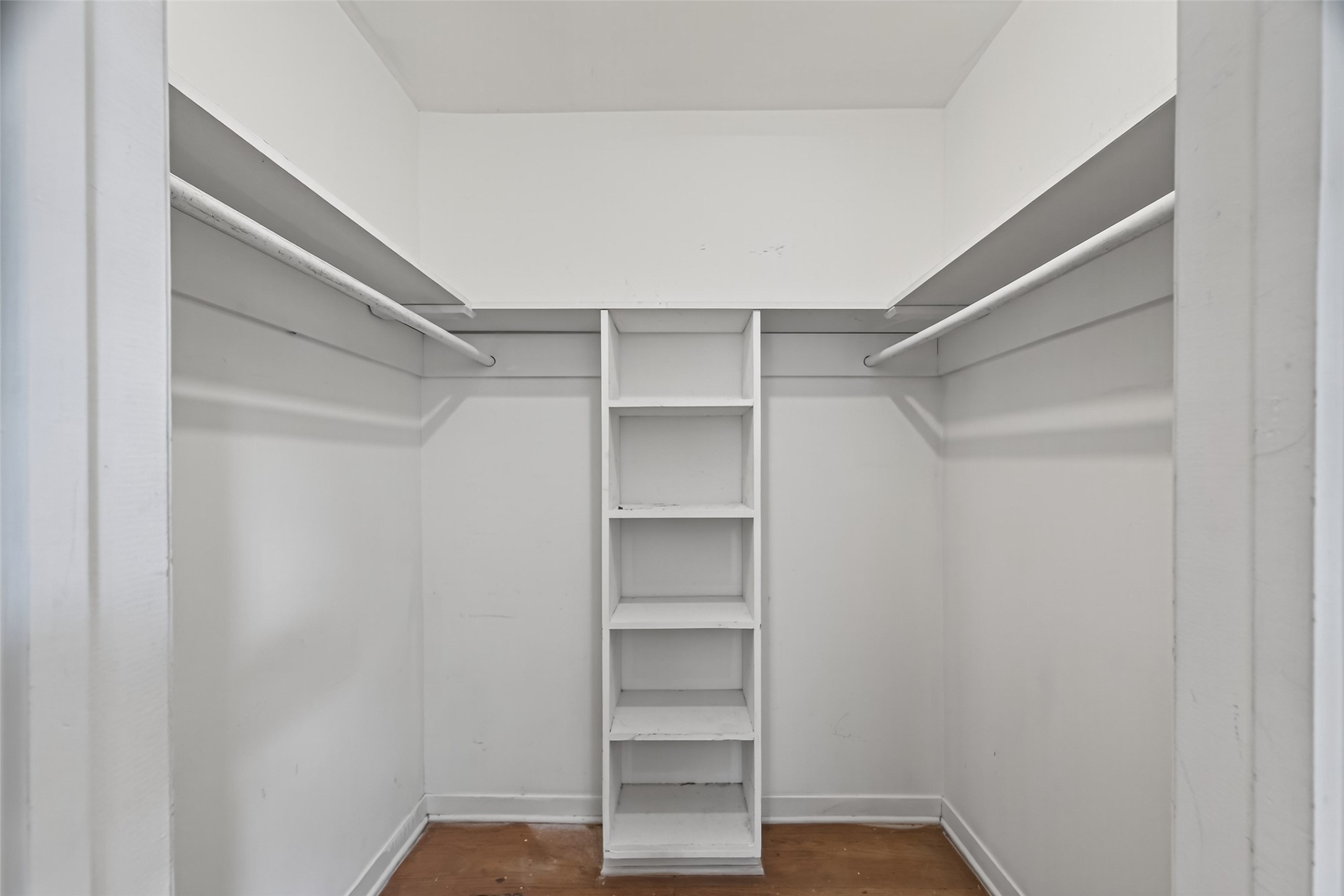 2609 Raspberry Lane Pasadena, TX 77502 - Photo 35 of 40 a view of walk in closet with empty racks