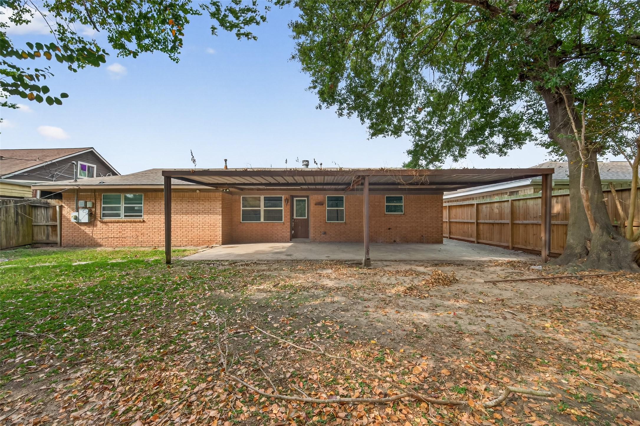 2609 Raspberry Lane Pasadena, TX 77502 - Photo 38 of 40 front view of a house with a garden