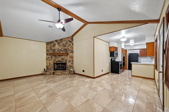 a view of a livingroom with a fireplace