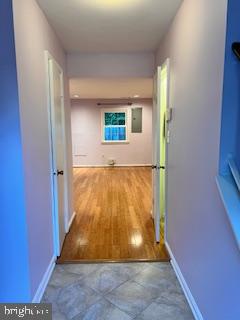 9218 Sprucewood Road Burke, VA 22015 - Photo 2 of 33 Inviting hallway leading to bright living space.