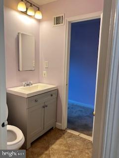 9218 Sprucewood Road Burke, VA 22015 - Photo 25 of 33 Charming bathroom with soft pastel hues.