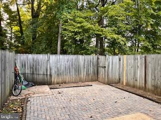 9218 Sprucewood Road Burke, VA 22015 - Photo 31 of 33 Secluded outdoor space with lush greenery.