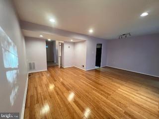 9218 Sprucewood Road Burke, VA 22015 - Photo 5 of 33 Spacious room with elegant hardwood floors.