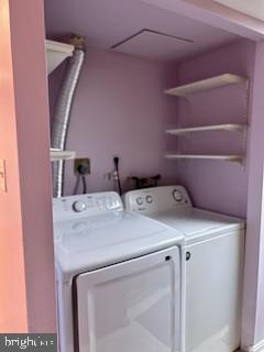 9218 Sprucewood Road Burke, VA 22015 - Photo 6 of 33 Charming laundry nook with pastel hues.