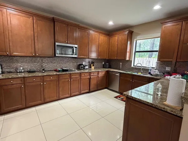 $6,000 | 9855 Northwest 89th Terrace, Doral, FL 33178