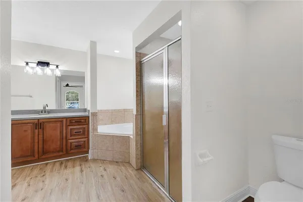 a bathroom with a bathtub and a sink