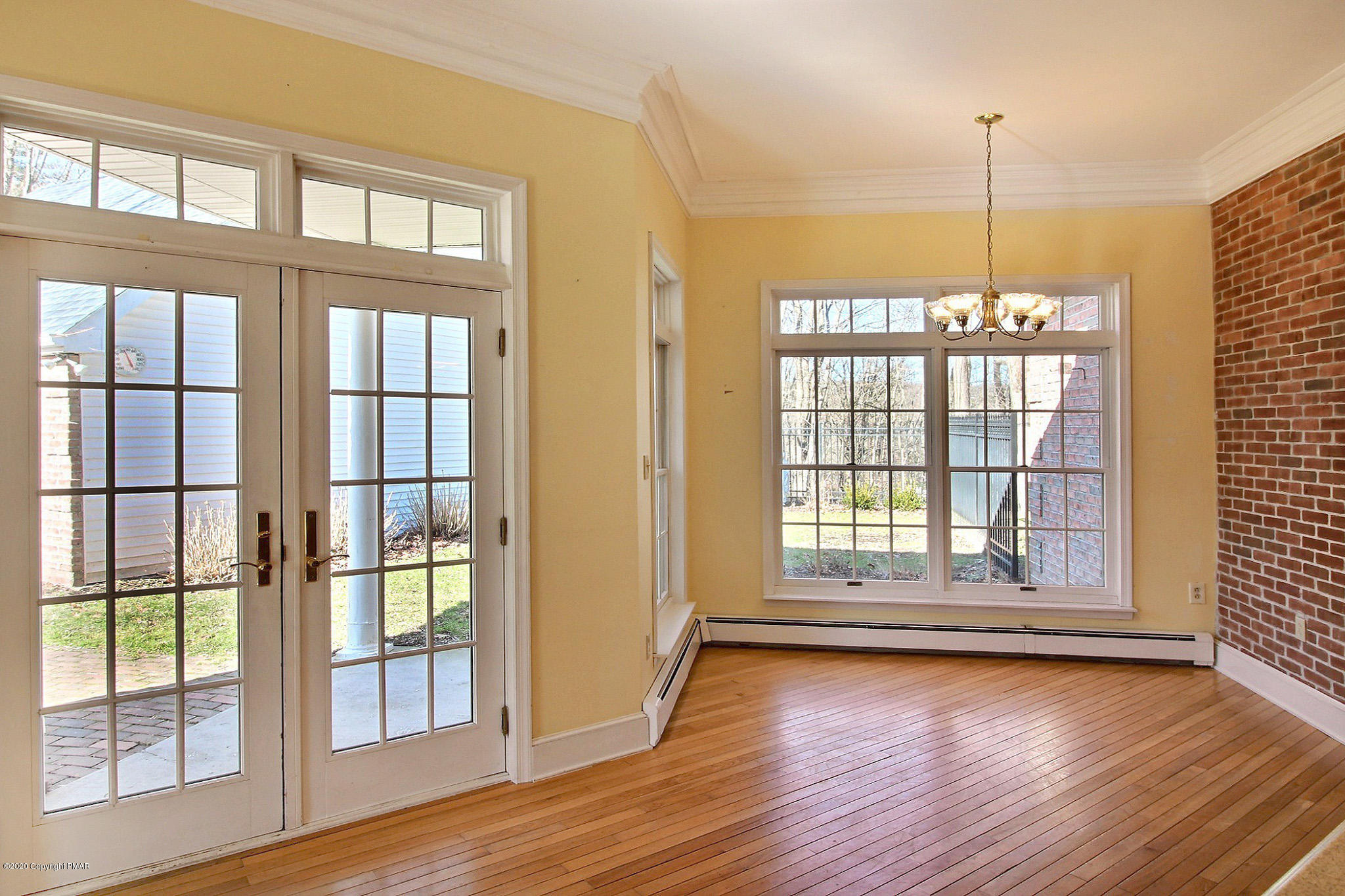5875 Cherry Valley Road Stroudsburg, PA 18360 - Photo 23 of 65 a view of a room with wooden floor and windows