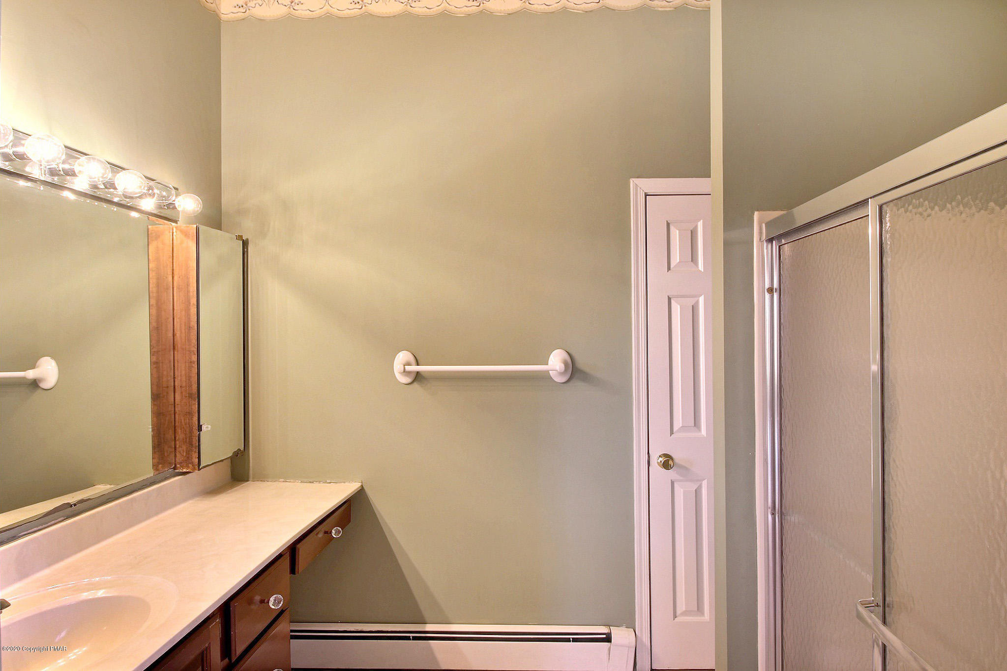 5875 Cherry Valley Road Stroudsburg, PA 18360 - Photo 42 of 65 a bathroom with a sink and a mirror