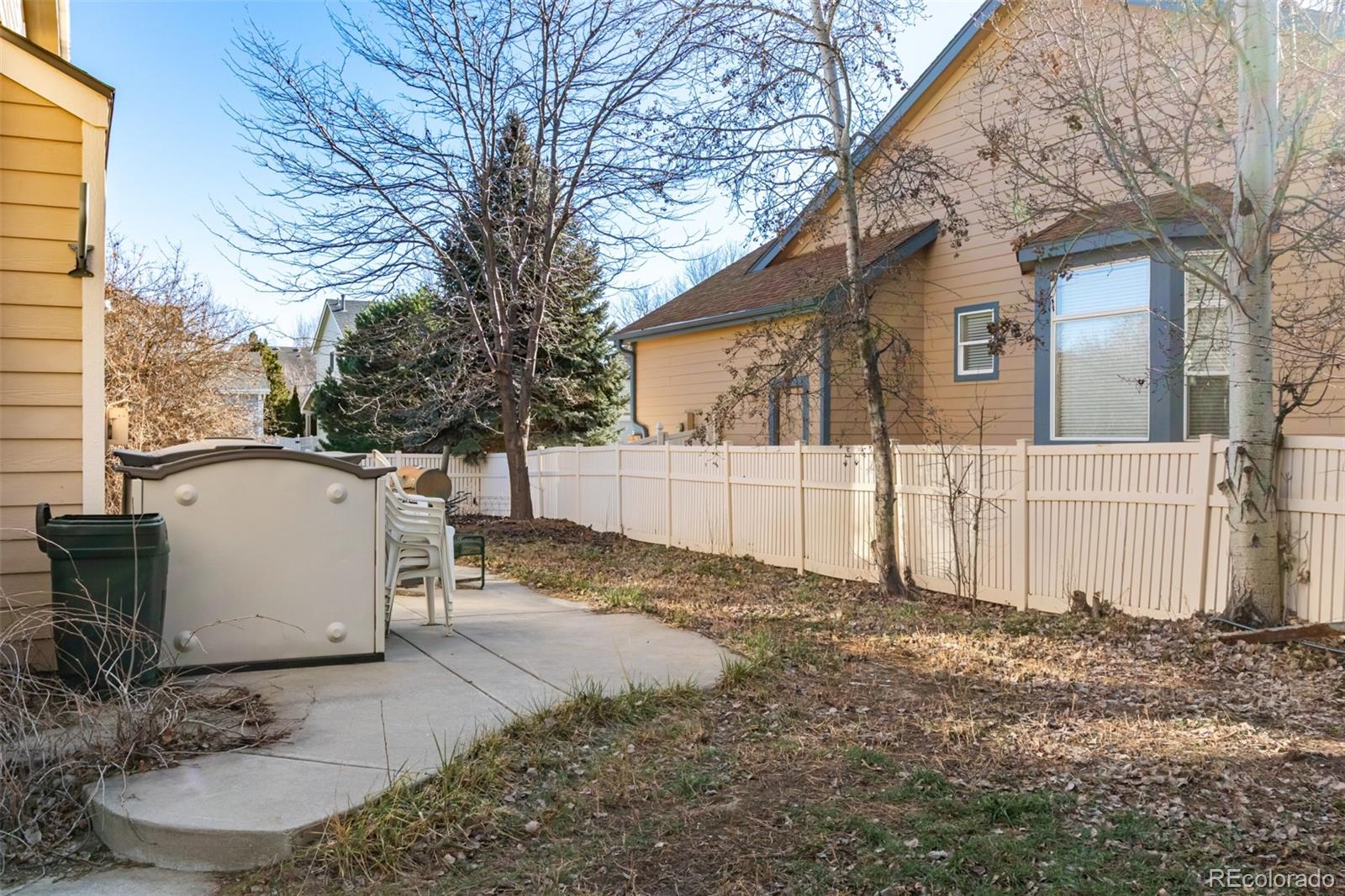 6542 Silverleaf Court Firestone, CO 80504 - Photo 16 of 18 a view of a house with a yard