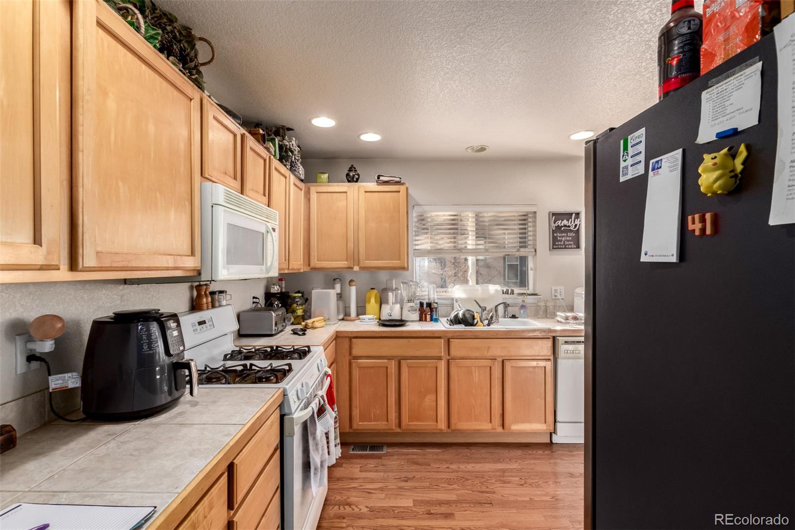 6542 Silverleaf Court Firestone, CO 80504 - Photo 4 of 18 a kitchen with lots of counter top space