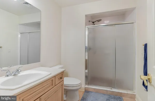 a view of balcony with wooden floor and fence