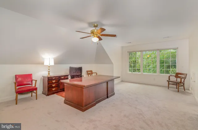 a view of barbeque grill with wooden floor and chair