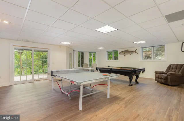 an aerial view of a house with outdoor space and street view