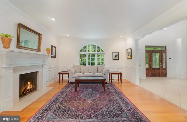 a kitchen with kitchen island granite countertop appliances cabinets and a sink