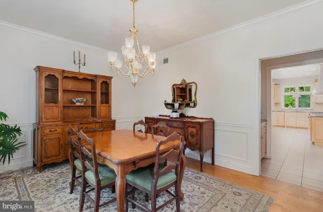 a kitchen with granite countertop cabinets a sink and a stove top oven