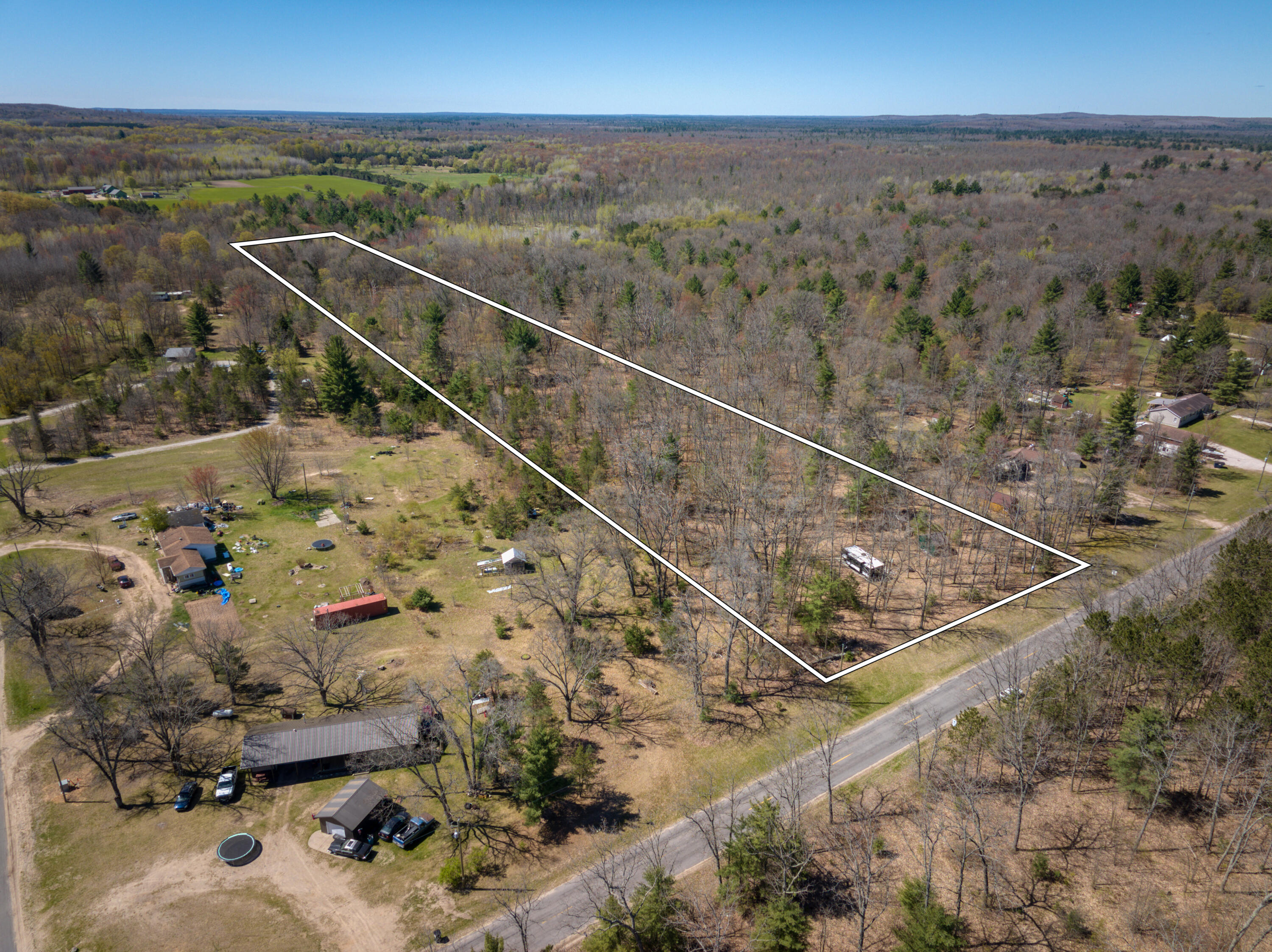 3911 East 3 Mile Road Luther, MI 49656 - Photo 4 of 21 DJI_20260511113429_0050_D_35