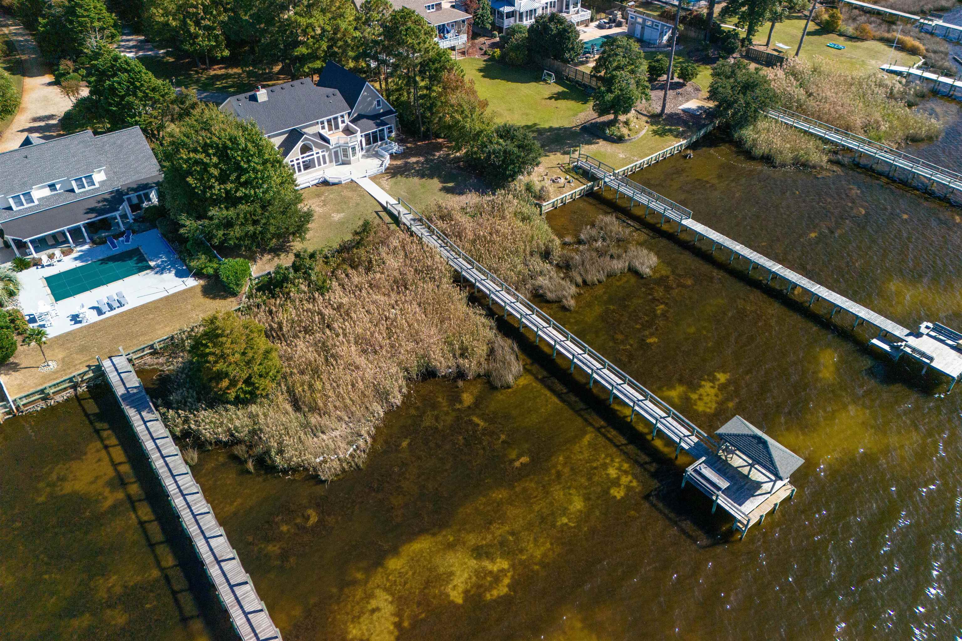 1052 Martins Point Road, Unit 13 Kitty Hawk, NC 27949 - Photo 42 of 47 Boat to Nearby Dining & Fun