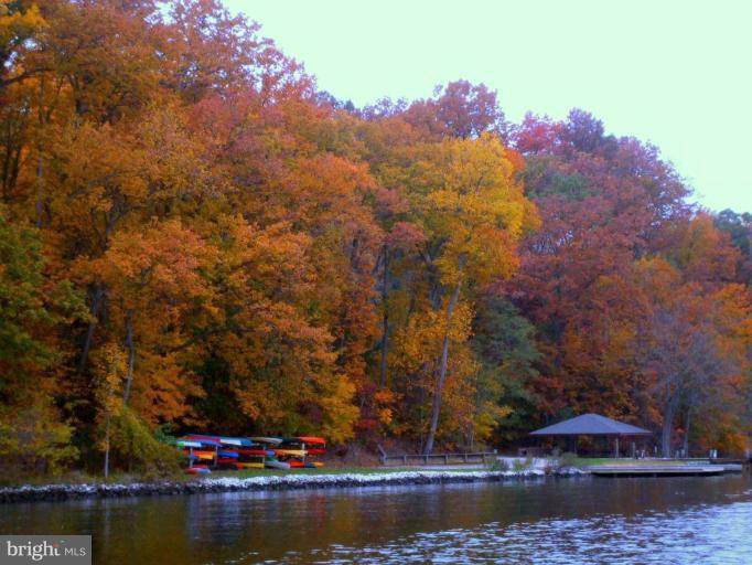 686 Discovery Road Davidsonville, MD 21035 - Photo 29 of 30 a view of a lake with a mountain