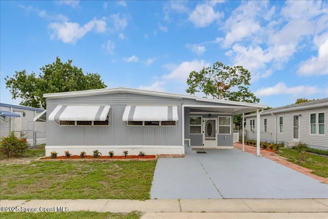 front view of a house with a patio
