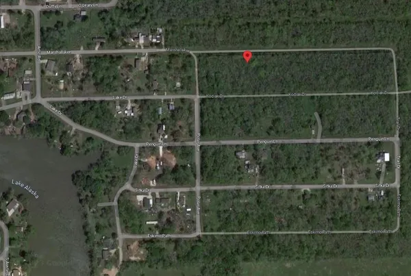 a view of a fence and house