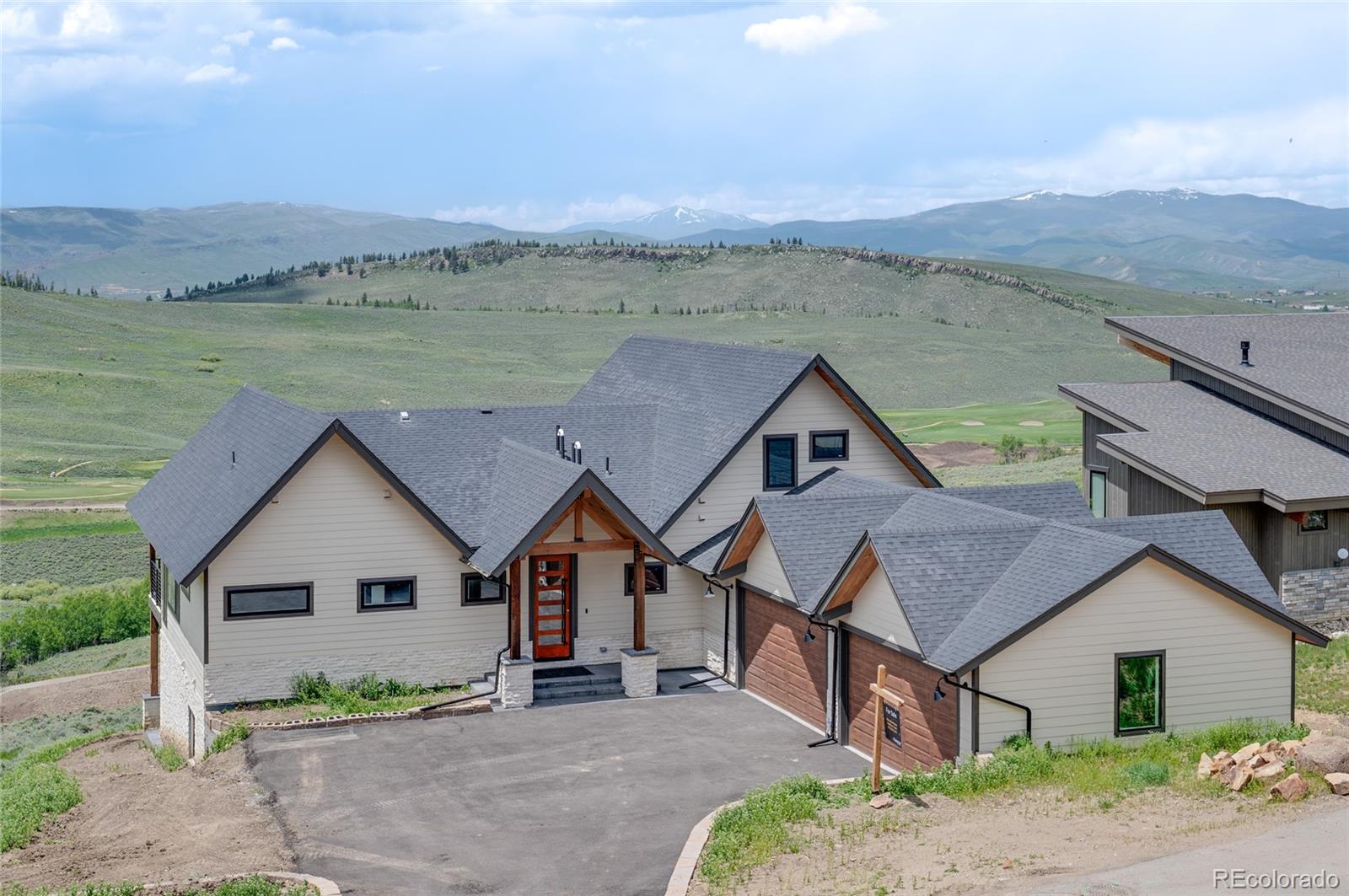 561 Upper Ranch View Drive Granby, CO 80446 - Photo 2 of 44 an aerial view of house with a yard and balcony