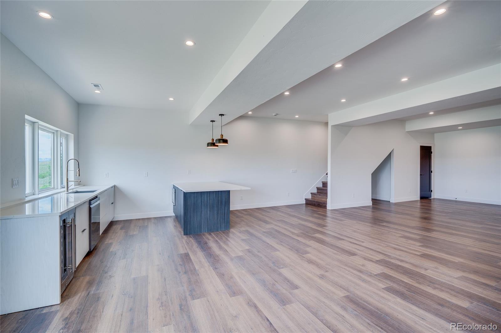 561 Upper Ranch View Drive Granby, CO 80446 - Photo 26 of 44 a view of empty room with wooden floor