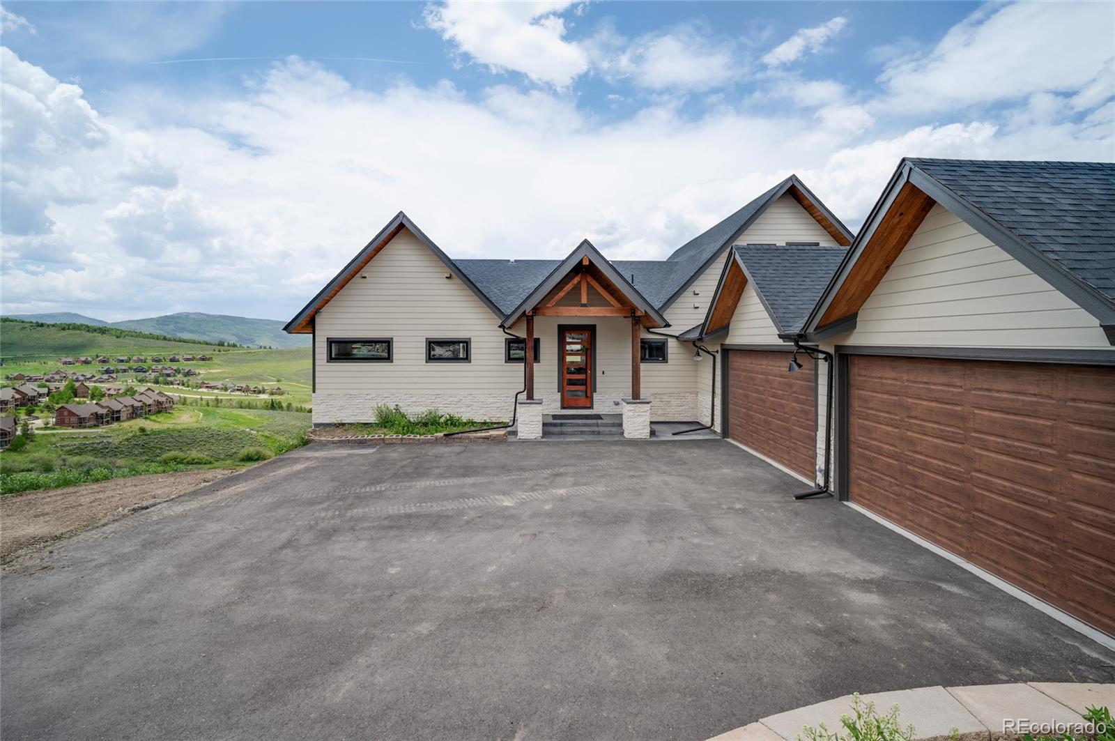 561 Upper Ranch View Drive Granby, CO 80446 - Photo 3 of 44 a view of a house with wooden fence
