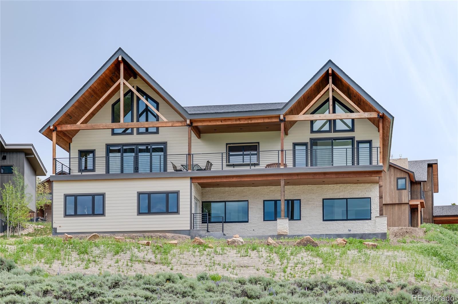 561 Upper Ranch View Drive Granby, CO 80446 - Photo 4 of 44 a front view of house with yard and green space
