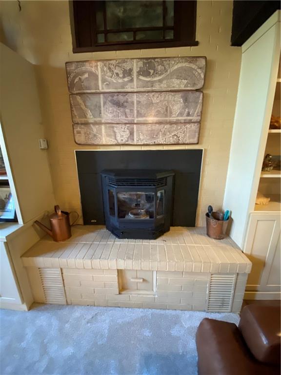 2300 Robbins Station Road North Huntingdon, PA 15642 - Photo 12 of 24 Great "fireplace" area with pellet stove in living room