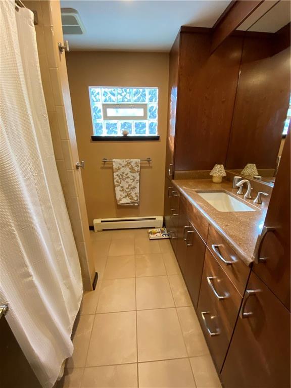 2300 Robbins Station Road North Huntingdon, PA 15642 - Photo 20 of 24 Second floor main bath with tub and shower. Nice cabinetry.
