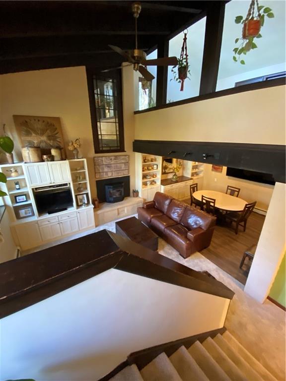 2300 Robbins Station Road North Huntingdon, PA 15642 - Photo 8 of 24 taken from the stairway - open concept living and dining room with beamed ceiling and lots of great built-ins