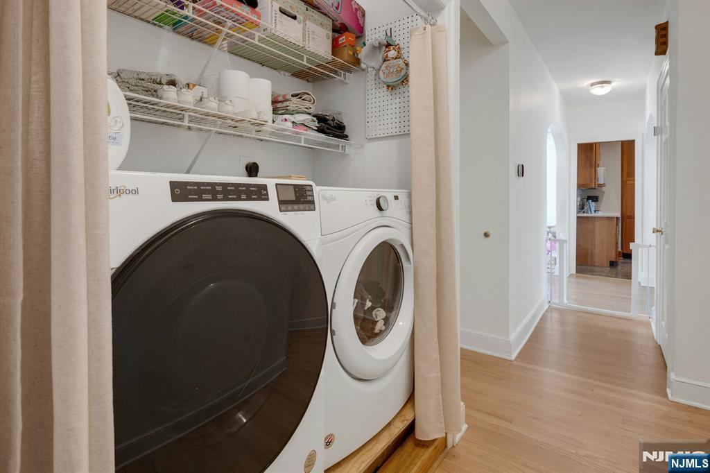 120 Meadowbrook Road Livingston, NJ 07039 - Photo 19 of 36 a utility room with dryer and washer