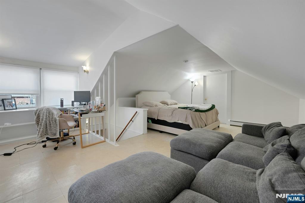 120 Meadowbrook Road Livingston, NJ 07039 - Photo 25 of 36 a living room with furniture gym equipment and a view of living room