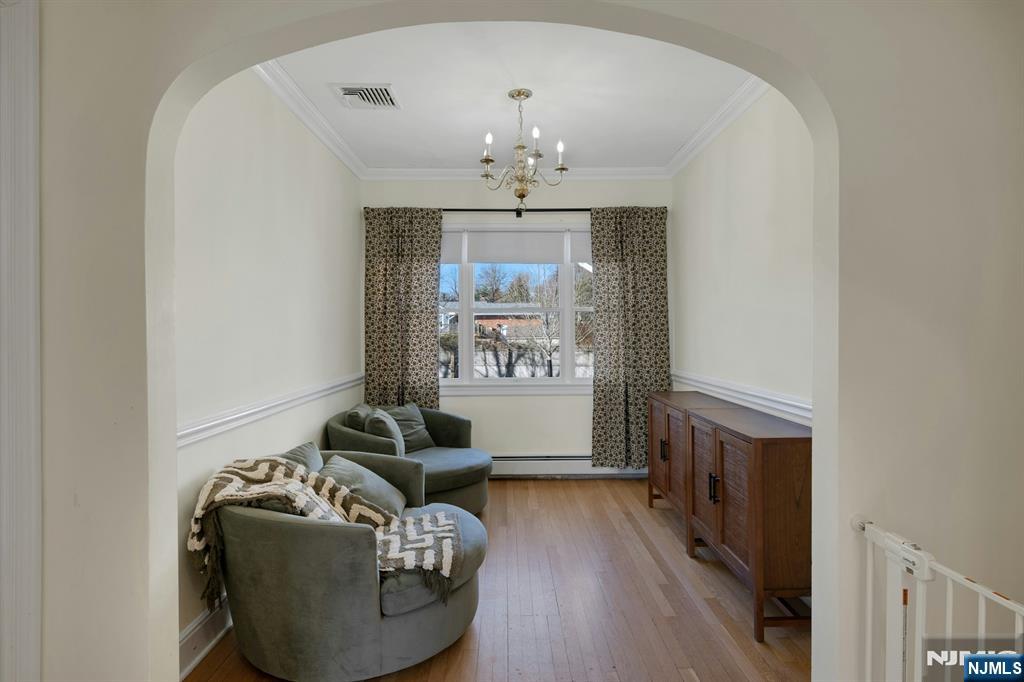 120 Meadowbrook Road Livingston, NJ 07039 - Photo 10 of 36 a living room with furniture and a fireplace