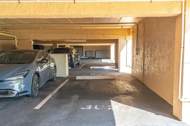 a view of a garage with car parked