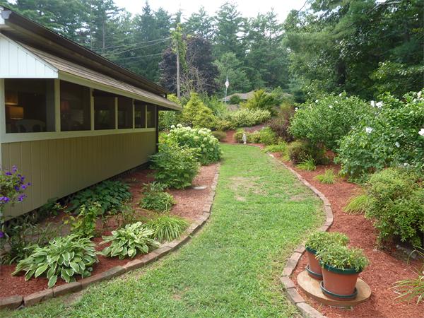 56 Monson Road Brimfield, MA 01010 - Photo 3 of 25 a view of a house with a backyard and garden