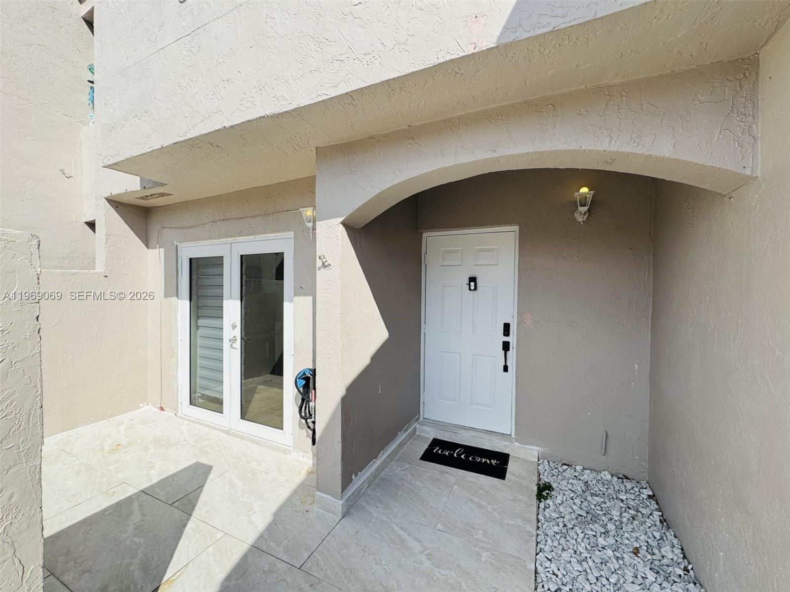 12853 Southwest 64th Lane Miami, FL 33183 - Photo 3 of 13 a view of an entryway