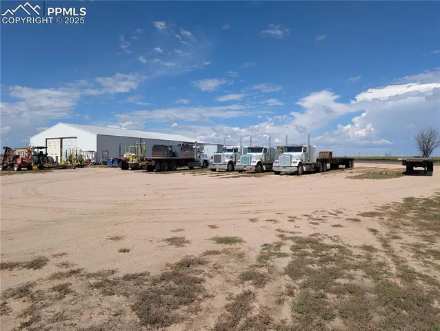 a view of a children toys back of the house