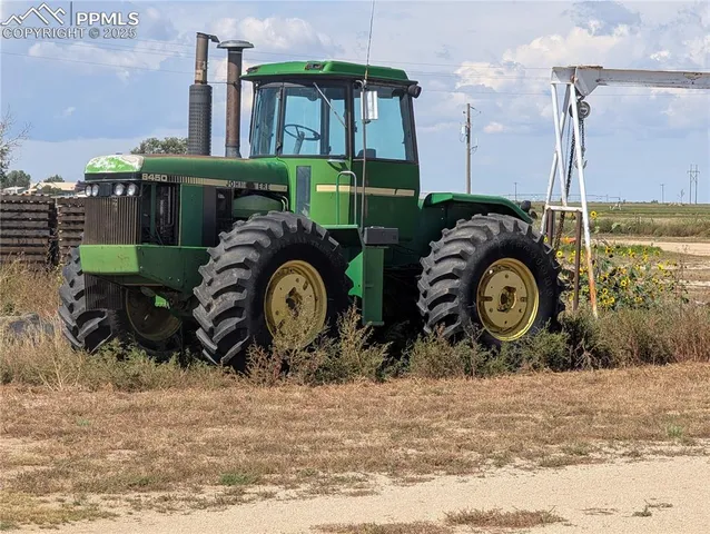 a kitchen with a table and chairs in it