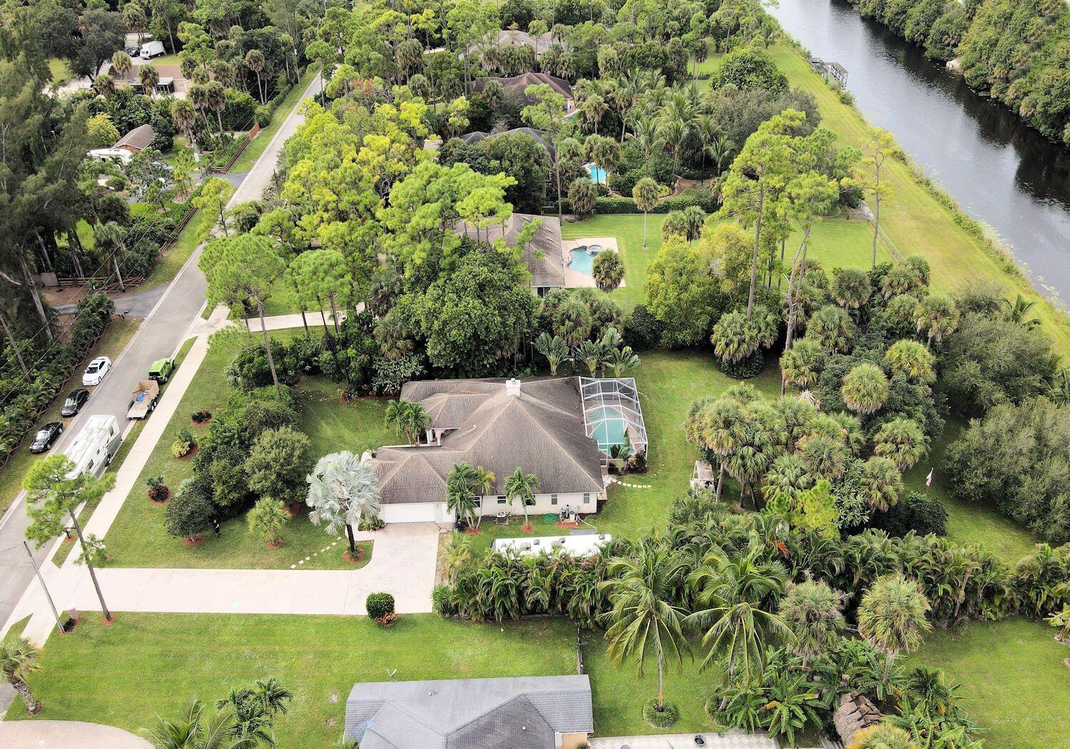 6863 Wilson Road West Palm Beach, FL 33413 - Photo 3 of 39 Aerial facing West higher elevation