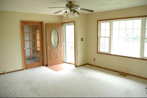 7868 South Sugar Island Road Chebanse, IL 60922 - Photo 3 of 12 a view of an empty room with a window