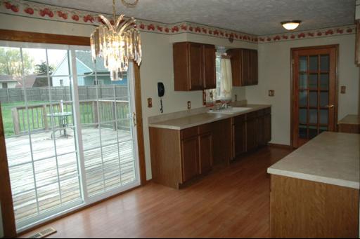 7868 South Sugar Island Road Chebanse, IL 60922 - Photo 4 of 12 a spacious bathroom with a double vanity sink and a mirror
