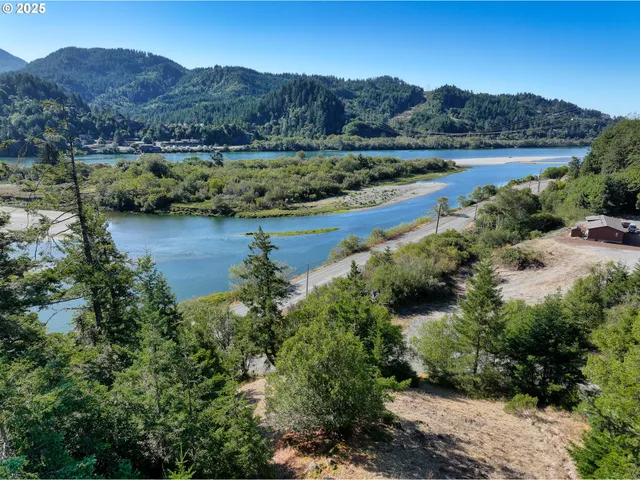 an aerial view of a residential houses and lake view
