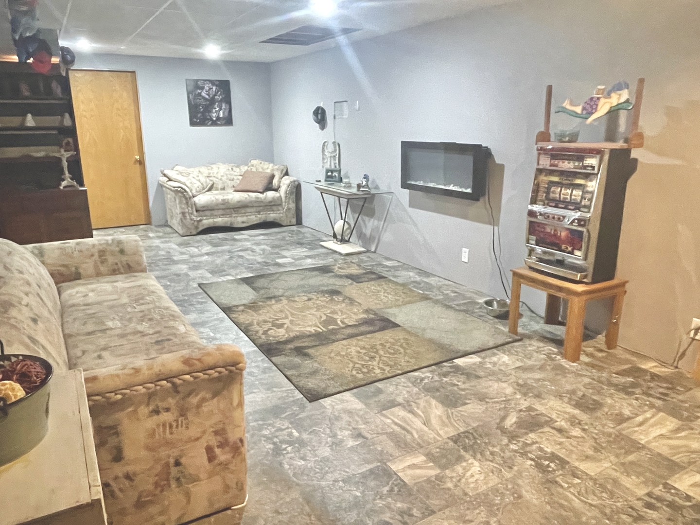 2867 East 752nd Road Utica, IL 61373 - Photo 15 of 23 a living room with furniture and a flat screen tv