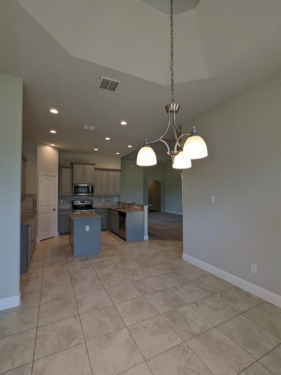 3741 Cecelia Lane Forest Hill, TX 76140 - Photo 4 of 16 a large kitchen with a counter space a sink and dishwasher