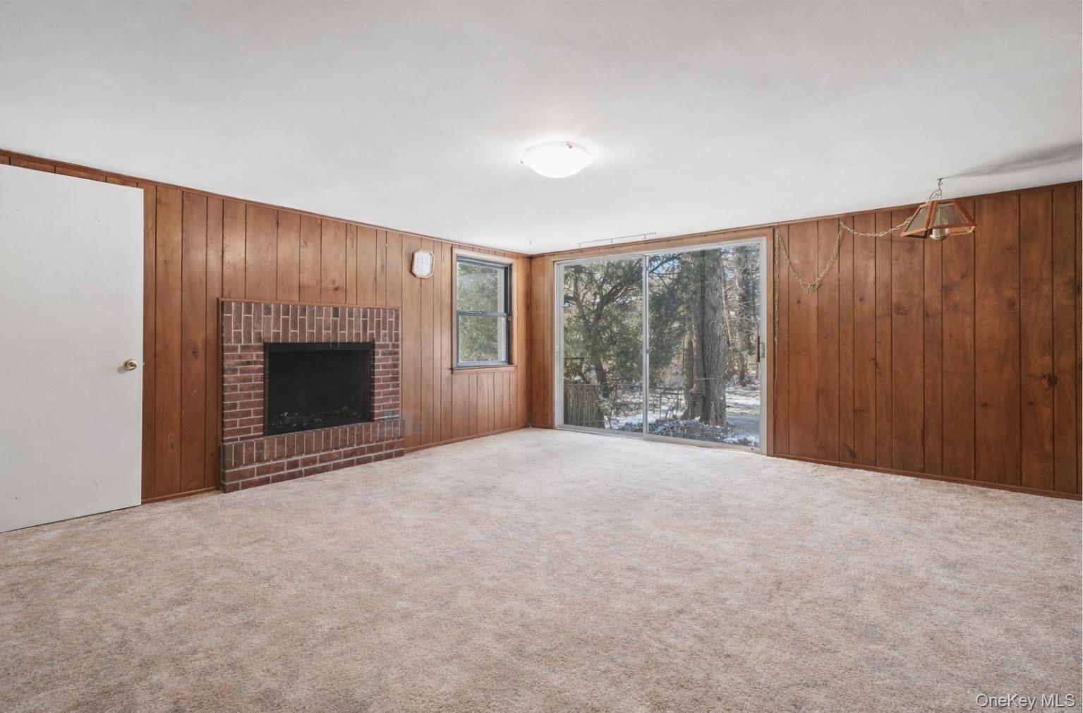 2 Churchill Road Rye Brook, NY 10573 - Photo 15 of 22 a view of an empty room with a fireplace and a window