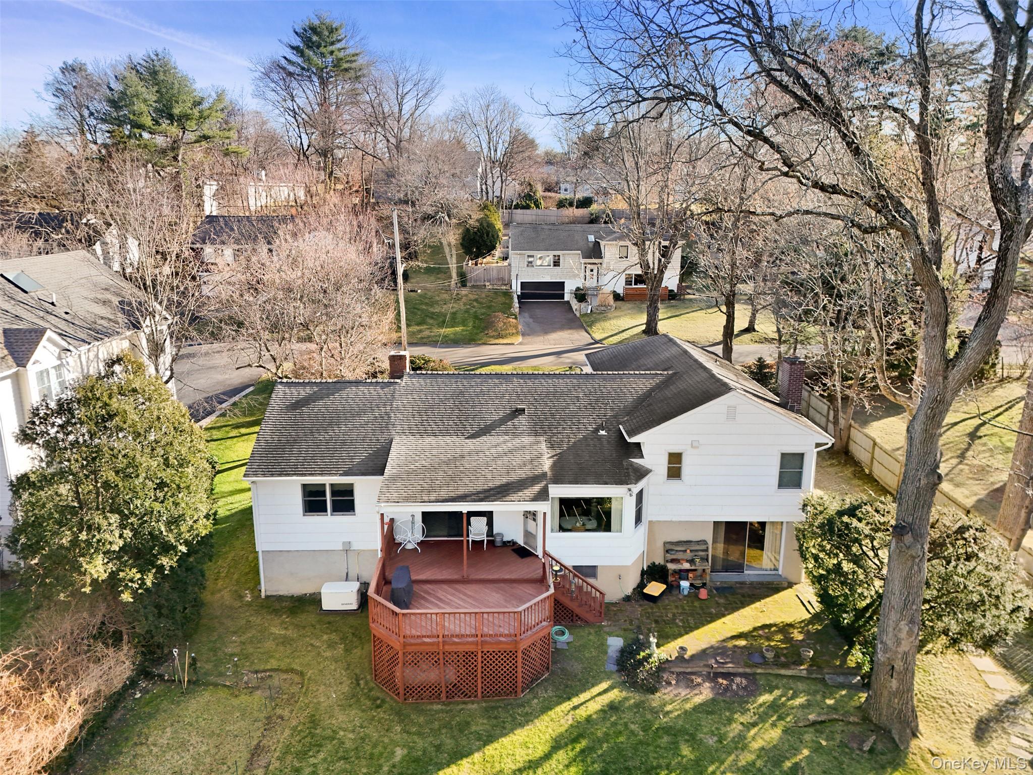 2 Churchill Road Rye Brook, NY 10573 - Photo 18 of 22 an aerial view of a house with backyard space and patio