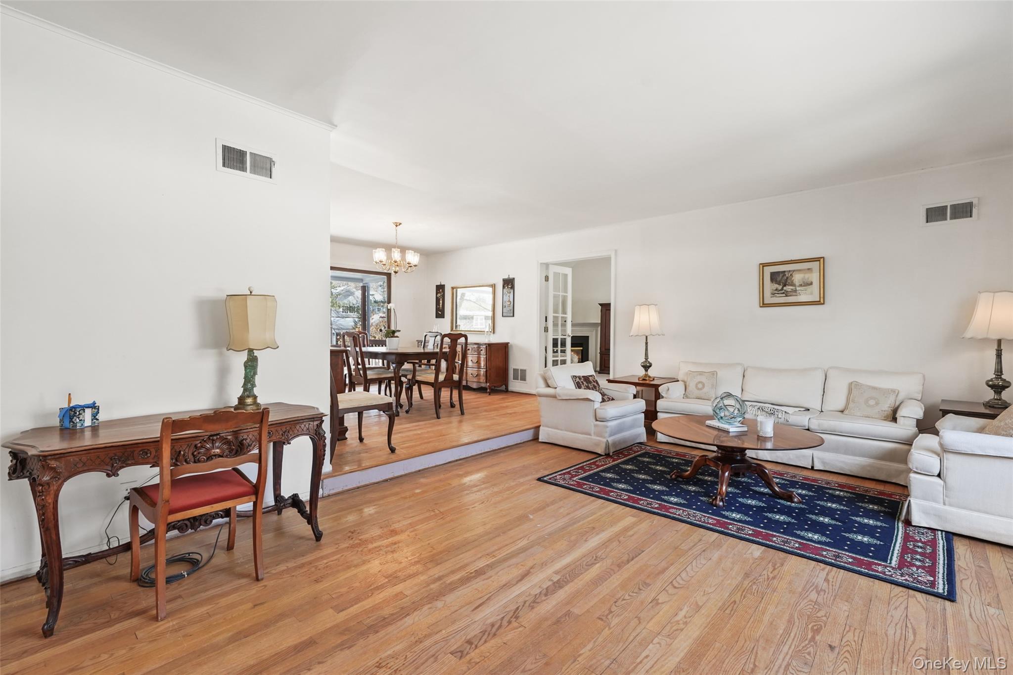 2 Churchill Road Rye Brook, NY 10573 - Photo 4 of 22 a living room with furniture and wooden floor