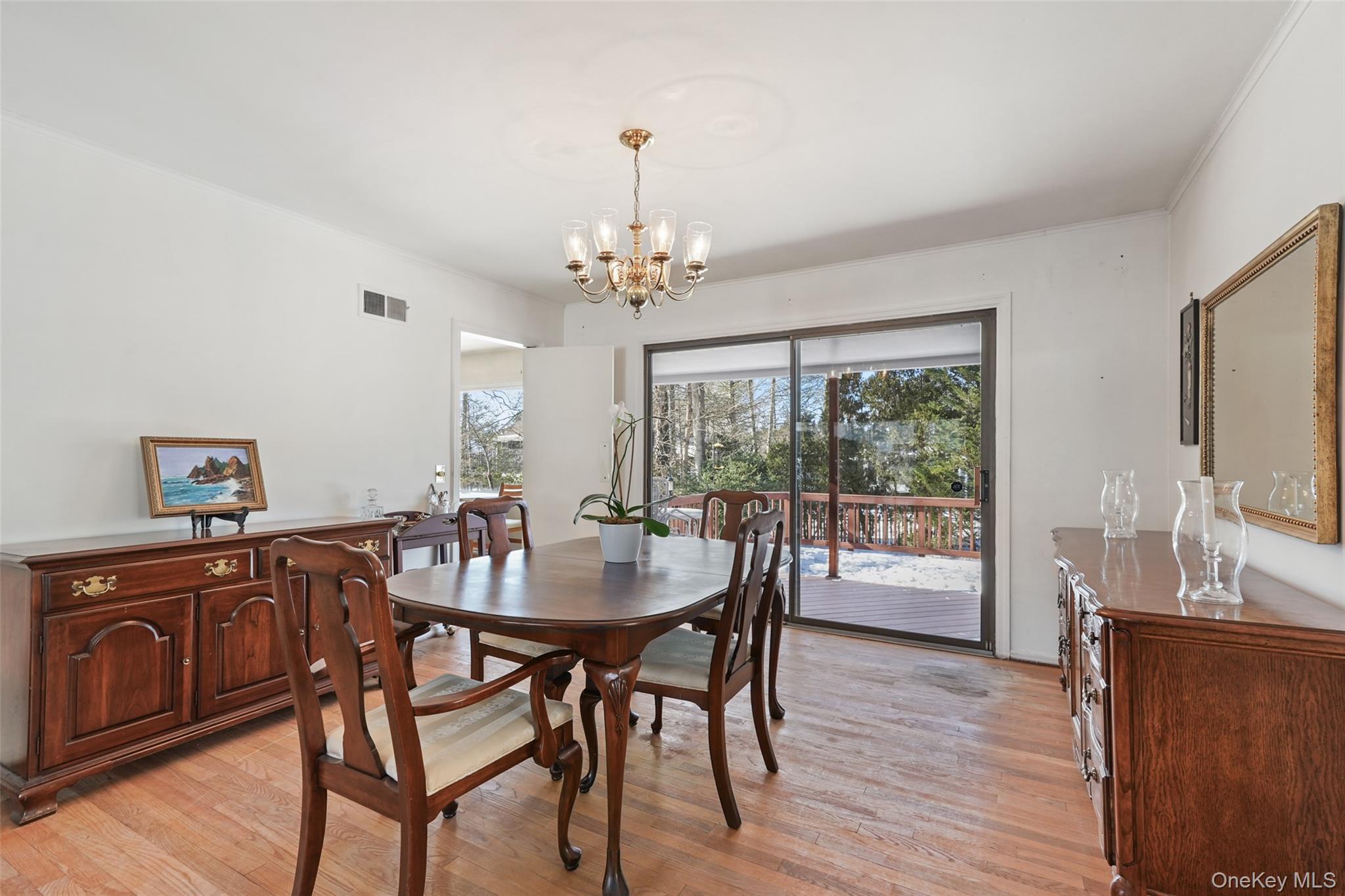 2 Churchill Road Rye Brook, NY 10573 - Photo 6 of 22 a view of a dining room with furniture window and wooden floor